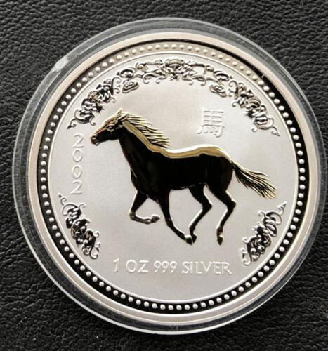 Срібна монета з позолотою 1 долар 2002 року. Рік Коня. Австралія. 31,1 грам Срібна монета з позолотою 1 долар 2002 року. Рік Коня. Австралія. 31,1 грам