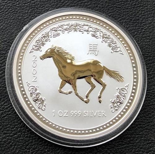 Срібна монета з позолотою 1 долар 2002 року. Рік Коня. Австралія. 31,1 грам Срібна монета з позолотою 1 долар 2002 року. Рік Коня. Австралія. 31,1 грам