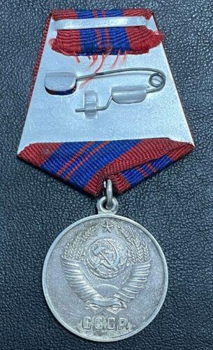 Комплект: За відмінну службу по охороні порядку і За бойові заслуги Комплект: За відмінну службу по охороні порядку і За бойові заслуги