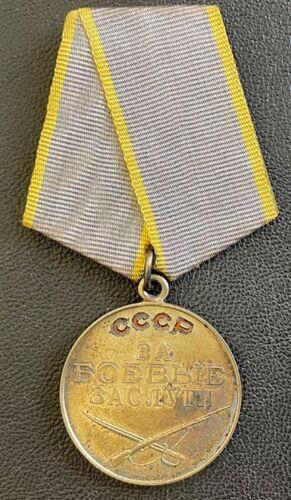 Медаль За бойові заслуги + книжка Медаль За бойові заслуги + книжка