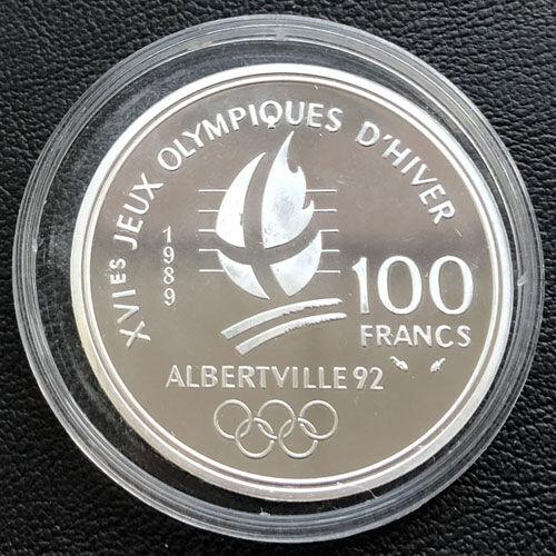 100 франків 1989 року,  «Олімпійські ігри в Альбервілі. Парне фігурне катання» , Франція, Proof 100 франків 1989 року,  «Олімпійські ігри в Альбервілі. Парне фігурне катання» , Франція, Proof
