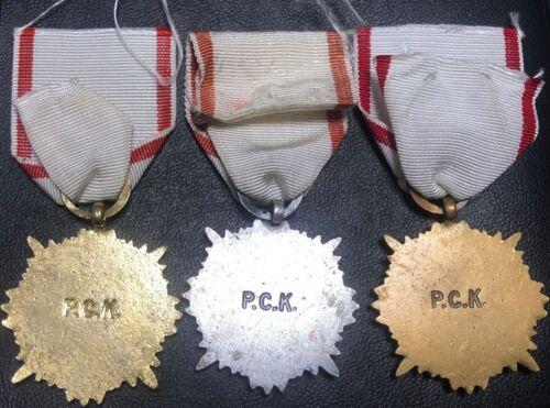 Комплект Хрестів «Заслуги Польського Червоного Хреста» 1,2,3 ступеня, Польща Комплект Хрестів «Заслуги Польського Червоного Хреста» 1,2,3 ступеня, Польща